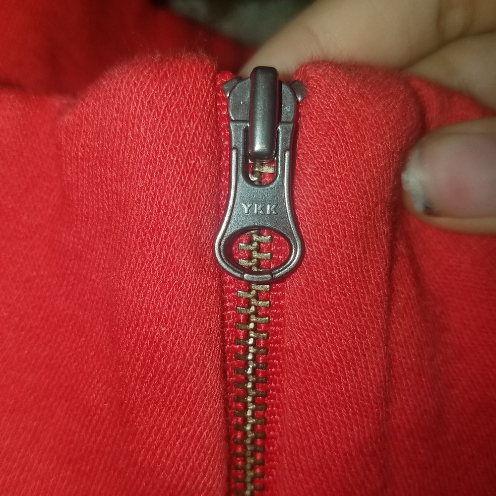 Red turtle neck with rainbow chest
